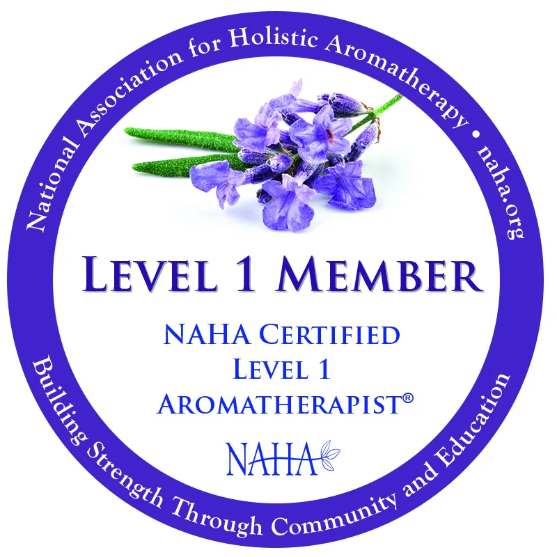 Badge for a Level 1 Member of the National Association for Holistic Aromatherapy, featuring purple flowers and text highlighting certification in aromatherapy.